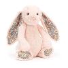peluche lapin rose avec du tissu liberty aux oreilles et au dessous des pattes. peluche lapin rose avec du tissu liberty aux oreilles et au dessous des pattes.