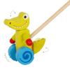 LE CROCODILE À POUSSER REMUANT LA TÊTE ET LA QUEUE