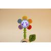 HOCHET FLEUR MUSICALE ET SOURIANTE