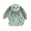 peluche lapin vert d'eau avec du tissu liberty dans les oreilles et sous les pattes. peluche lapin vert d'eau avec du tissu liberty dans les oreilles et sous les pattes.